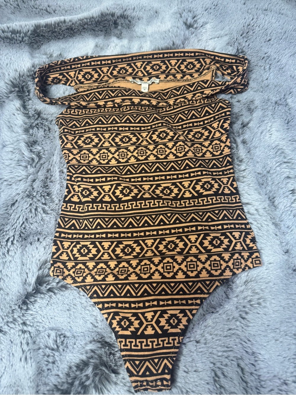 Express Kids One-Piece Bodysuit in Black and Tan Tribal Print